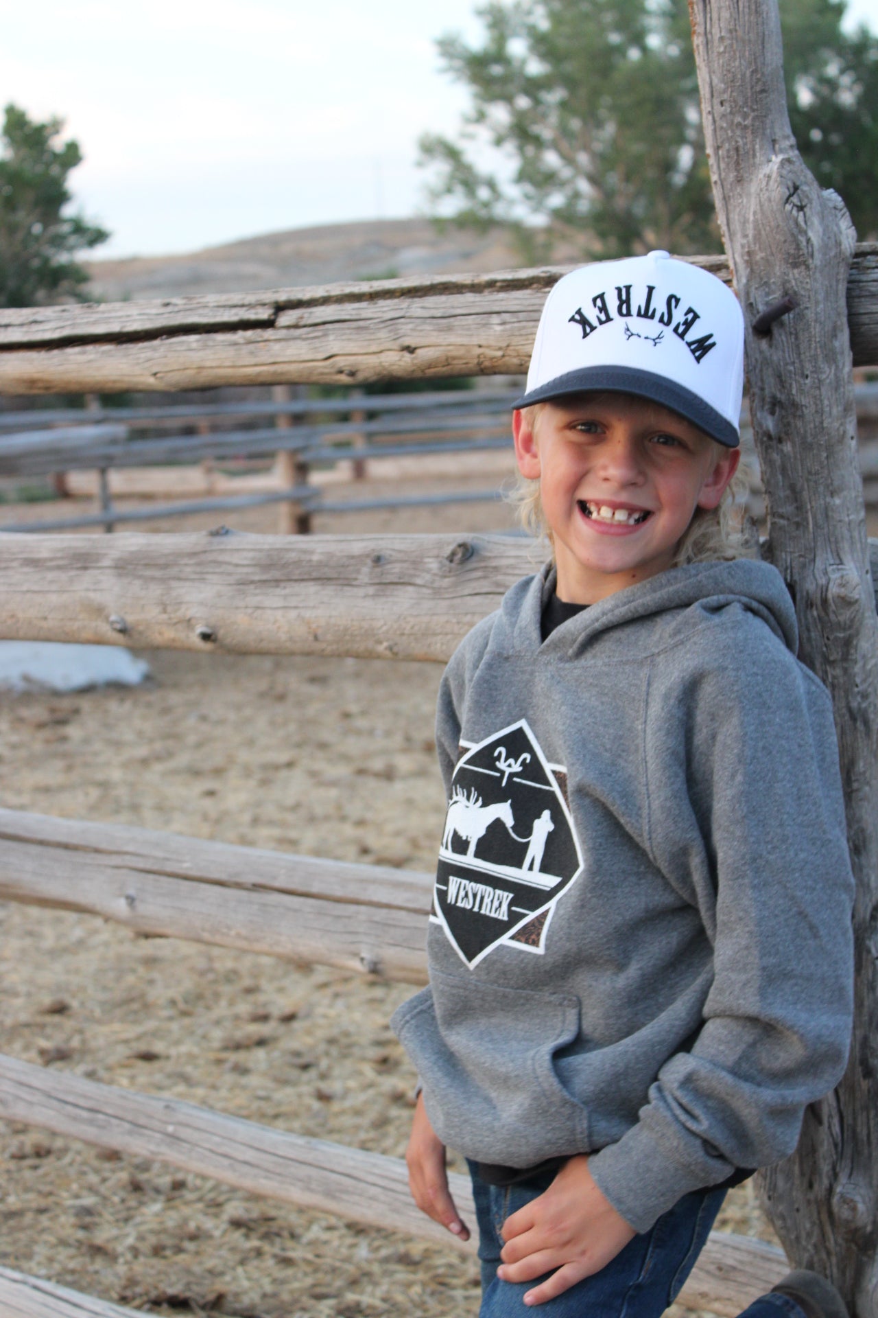 Upside down Westrek black and white trucker hat