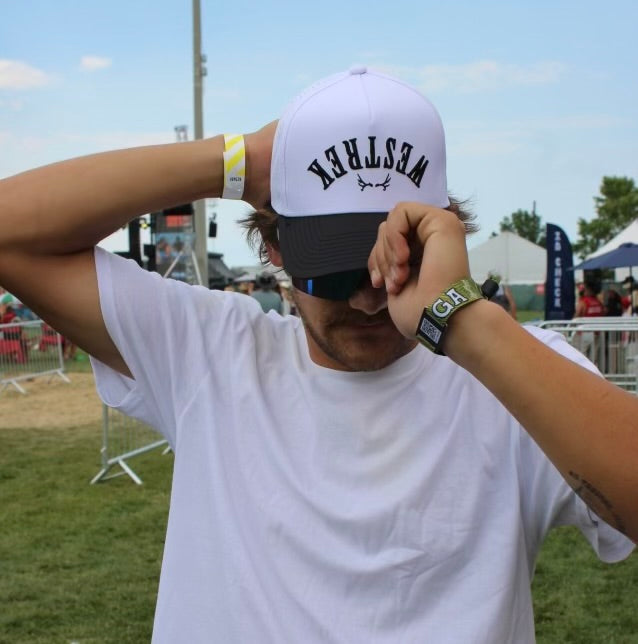 Upside down Westrek black and white trucker hat